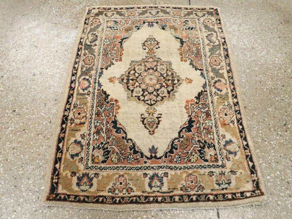This early 20th-century Persian Tabriz Hagi Jalili rug, measuring 2' 0