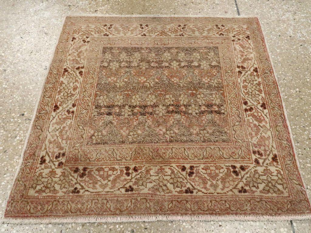 This early 20th-century Persian Tabriz Hagi Jalili rug, measuring 2' 0