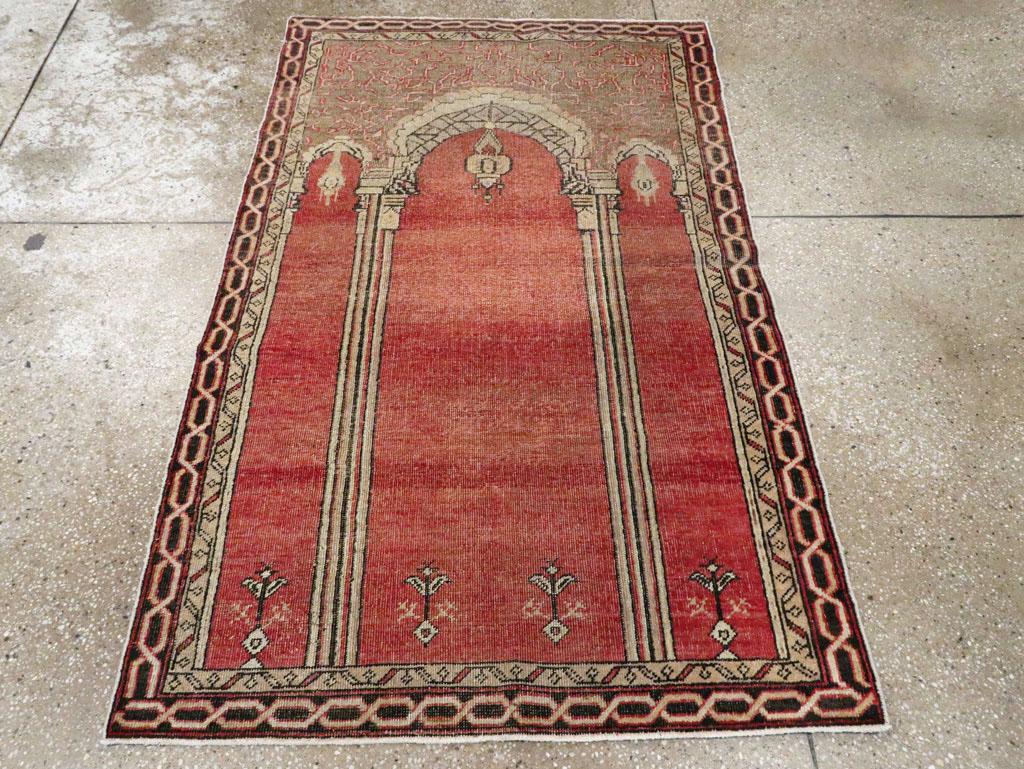 This early 20th century Turkish Oushak rug, measuring 3' 4