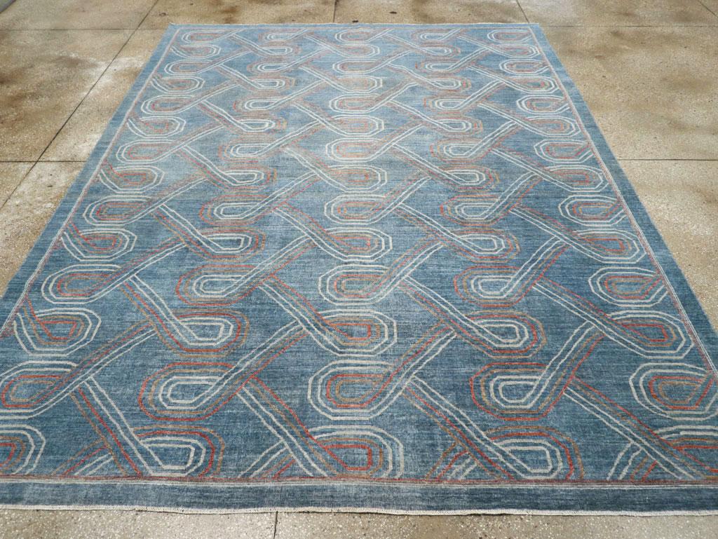 A modern Turkish room size carpet handmade during the 21st century.

Measures: 8' 10