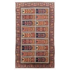 Collection Shabab Collection du milieu du 20e siècle du Turkestan oriental Khotan Tapis d'accent