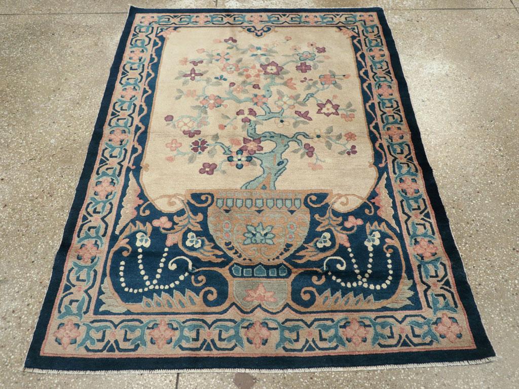 A vintage Chinese Art Deco accent rug handmade during the mid-20th century.

Measures: