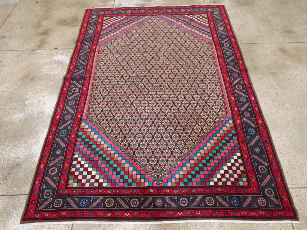 A vintage Persian Art Deco style Hamadan accent carpet handmade during the mid-20th century.

Measures: 6' 4
