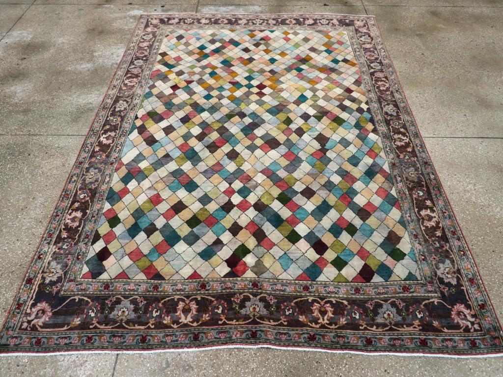 A vintage Persian Mahal Art Deco accent rug handmade during the mid-20th century.

Measures: 6' 4