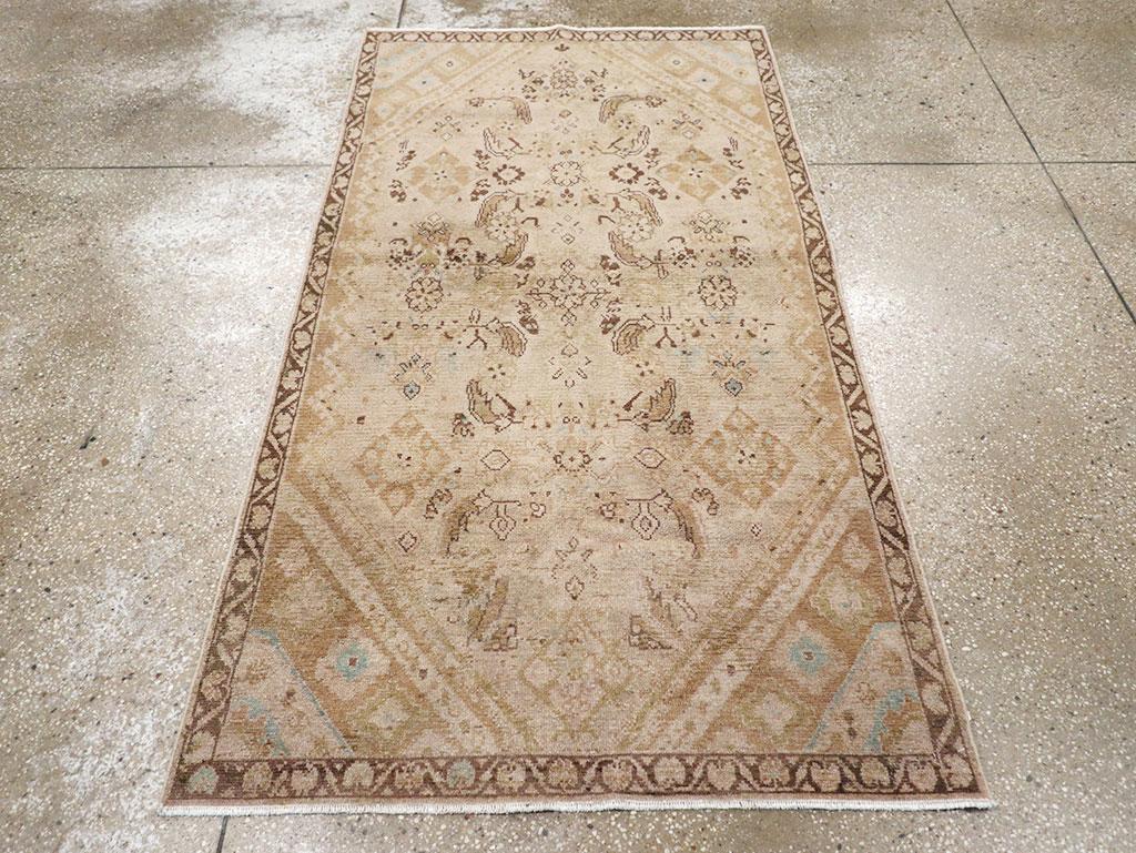 This mid-20th century Persian Malayer rug, measuring 3' 4