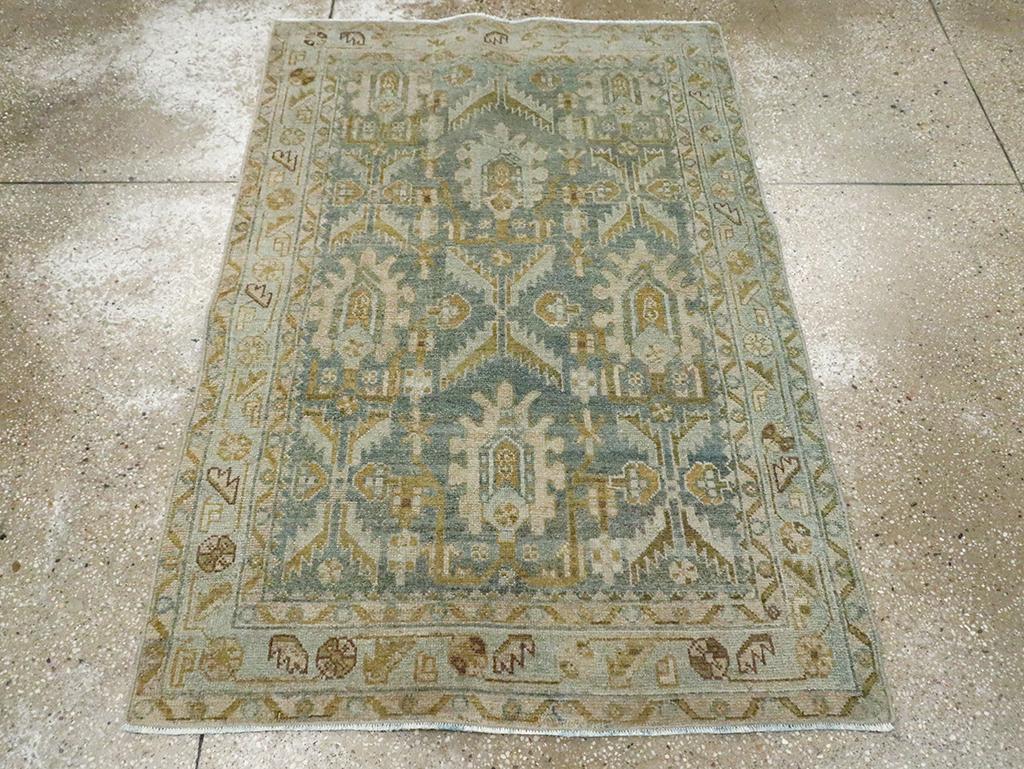 This mid-20th century Persian Malayer rug, measuring 3' 5