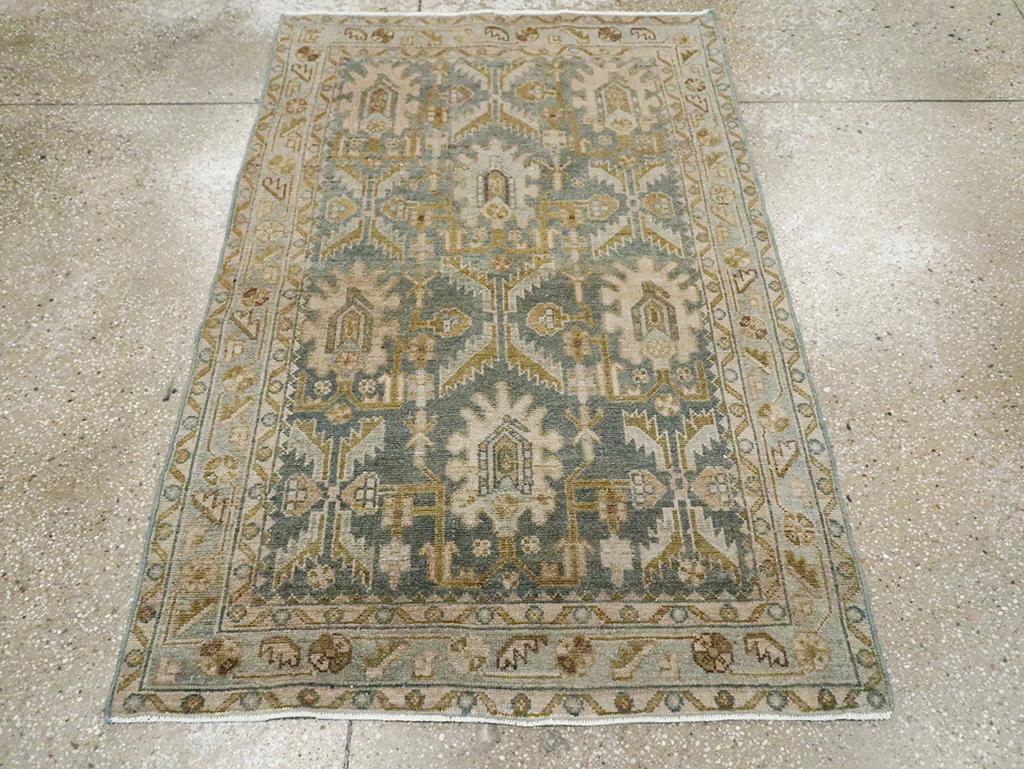 This mid-20th century Persian Malayer rug, measuring 3' 5
