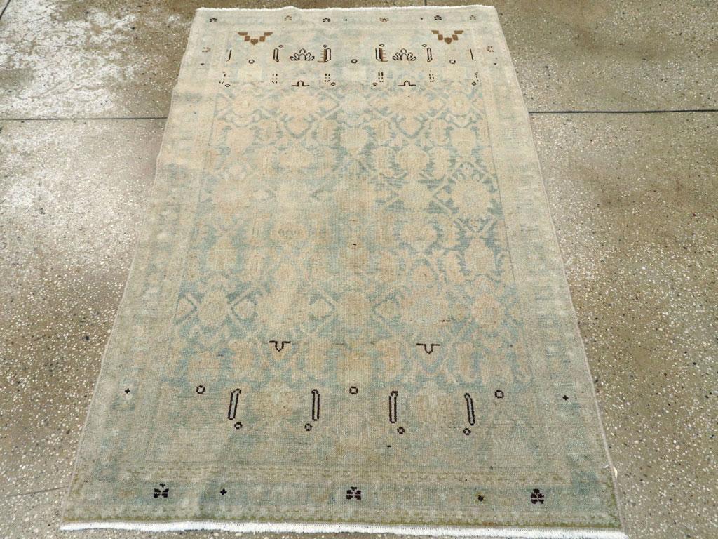 This mid-20th century Persian Malayer rug, measuring 3' 5