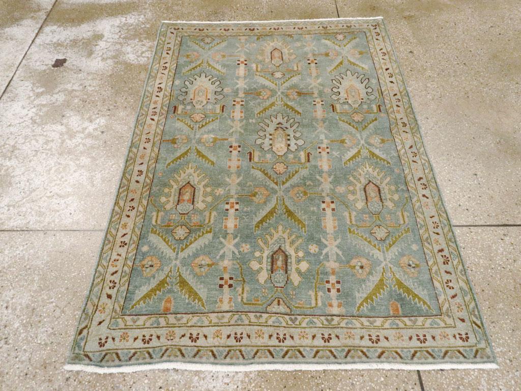 Questo tappeto persiano Malayer della metà del XX secolo, che misura 3' 6
