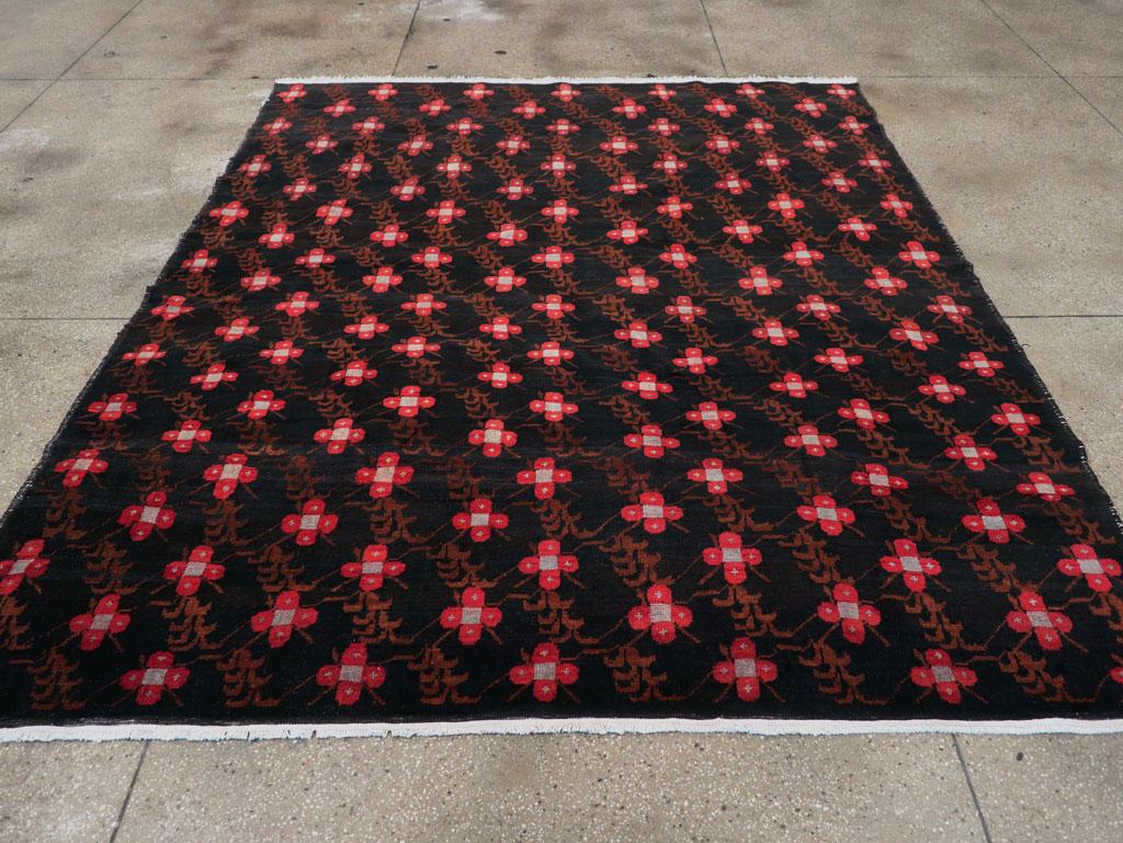 This mid-20th century Turkish Anatolian carpet, measuring 8' 1