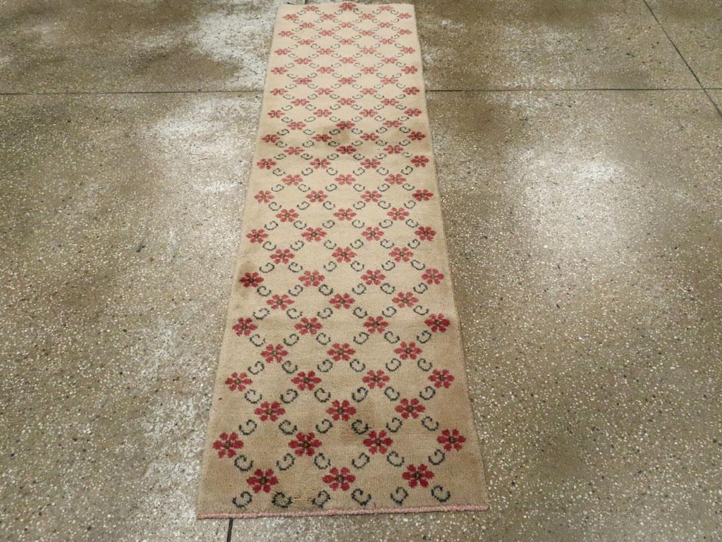 This mid-20th century Turkish Anatolian runner, measuring 1' 10