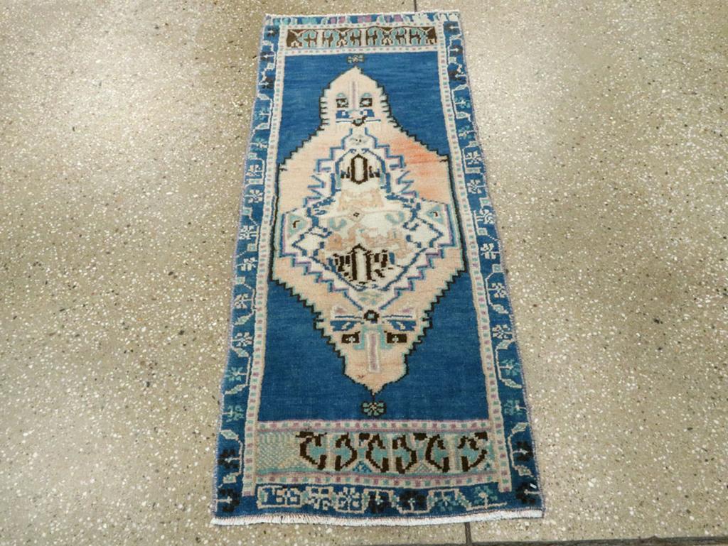 This mid-20th-century Turkish Anatolian rug, measuring 1' 6