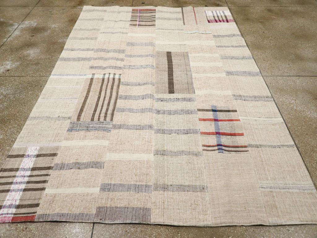 A vintage Turkish flatweave Kilim small room size carpet handmade during the Mid-20th Century.

Measures: 7' 0