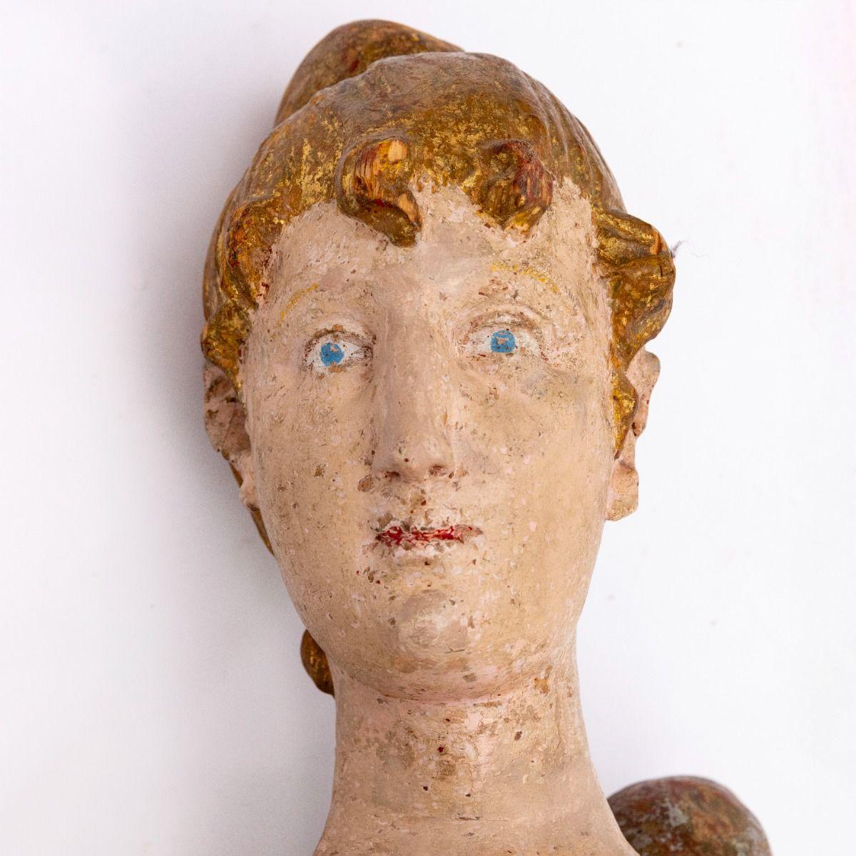 Figurehead of a mermaid from a Northern European ship, circa 1820-1830.

The figure is crafted from pine wood and painted with original polychrome colors. The mermaid boasts a well-preserved patina that accentuates the original details and colors.