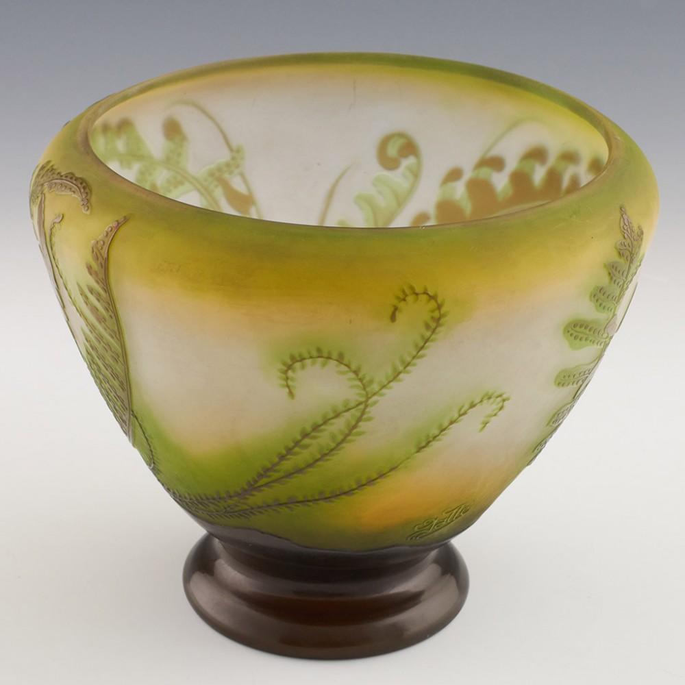 Heading : Galle cameo glass vase
Date : c1920
Period : Early 20th century
Origin : France
Colour : Opaque vlear and lime ground. Two colour high relief cameo
Marks : Signed on the body ‘Galle’ with tyhe pi type double ll and latin script e*
Body :