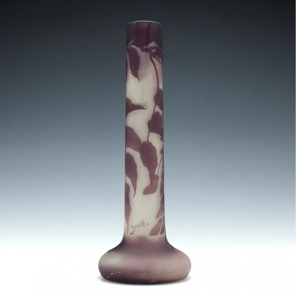 A very tall Galle cameo wisteria vase

Opaque and amethyst

circa 1900.

    