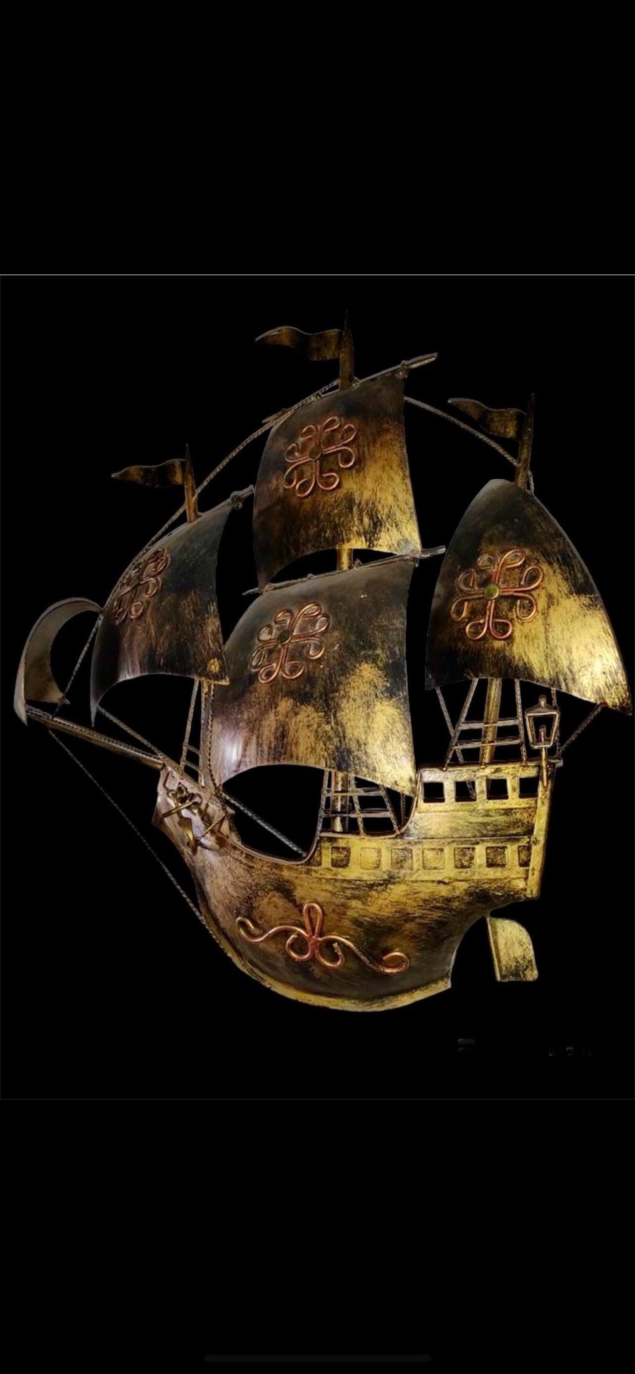 Galleon or sailing ship wall sconce, gilt iron. France / Spain, 1950s
In the style of Gilbert Poillerat.
This pair bateau galleon wall light was handcrafted by artist at the mid-20th century period representing the research of the new world , the