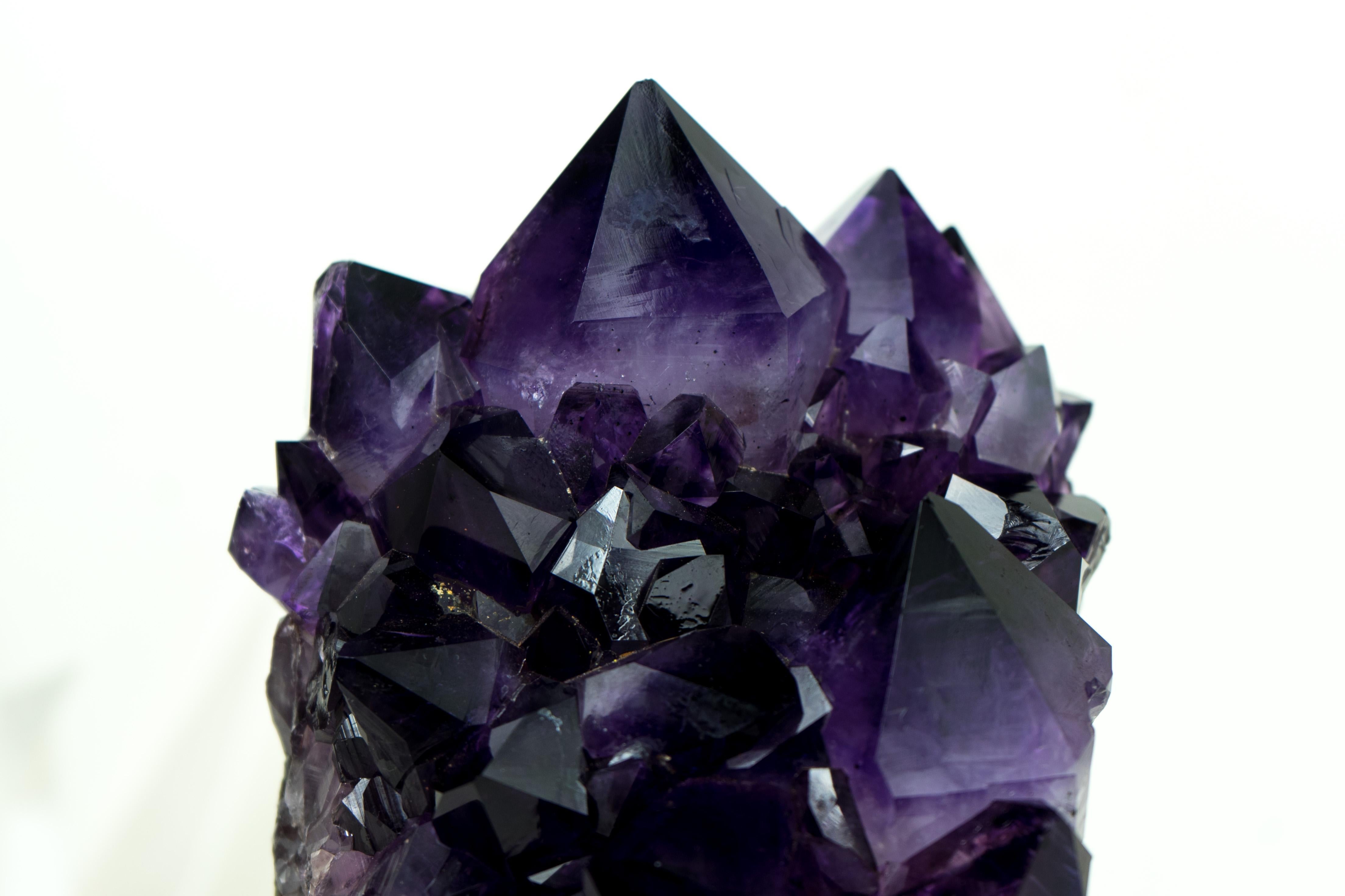 This AAA-Grade Amethyst Cluster stands as an extraordinary gem with world-class characteristics. Featuring dark, rich, and AAA-Grade Amethyst Druzy, this cluster brings unparalleled beauty and aesthetics, surely becoming an ideal addition for