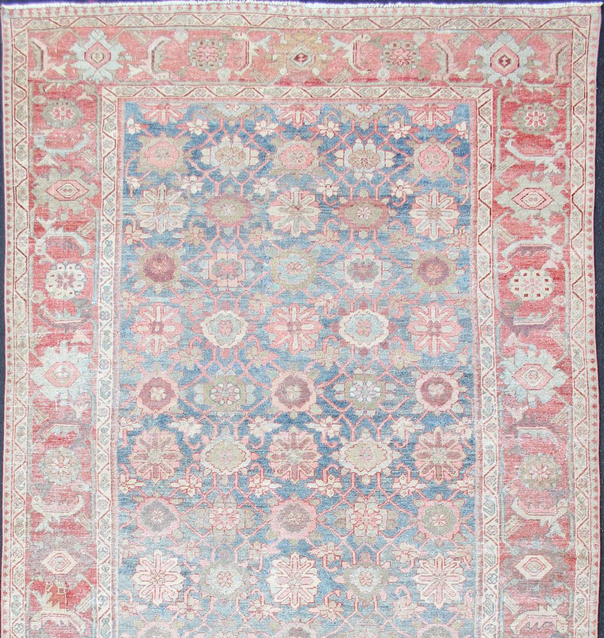 Persian Mahal antique rug with floral design in blue, and red colors with all-over design, rug R20-66, country of origin / type: Iran / Mahal, circa 1900.

This antique Persian Mahal rug, circa early 20th century, relies heavily on exquisite
