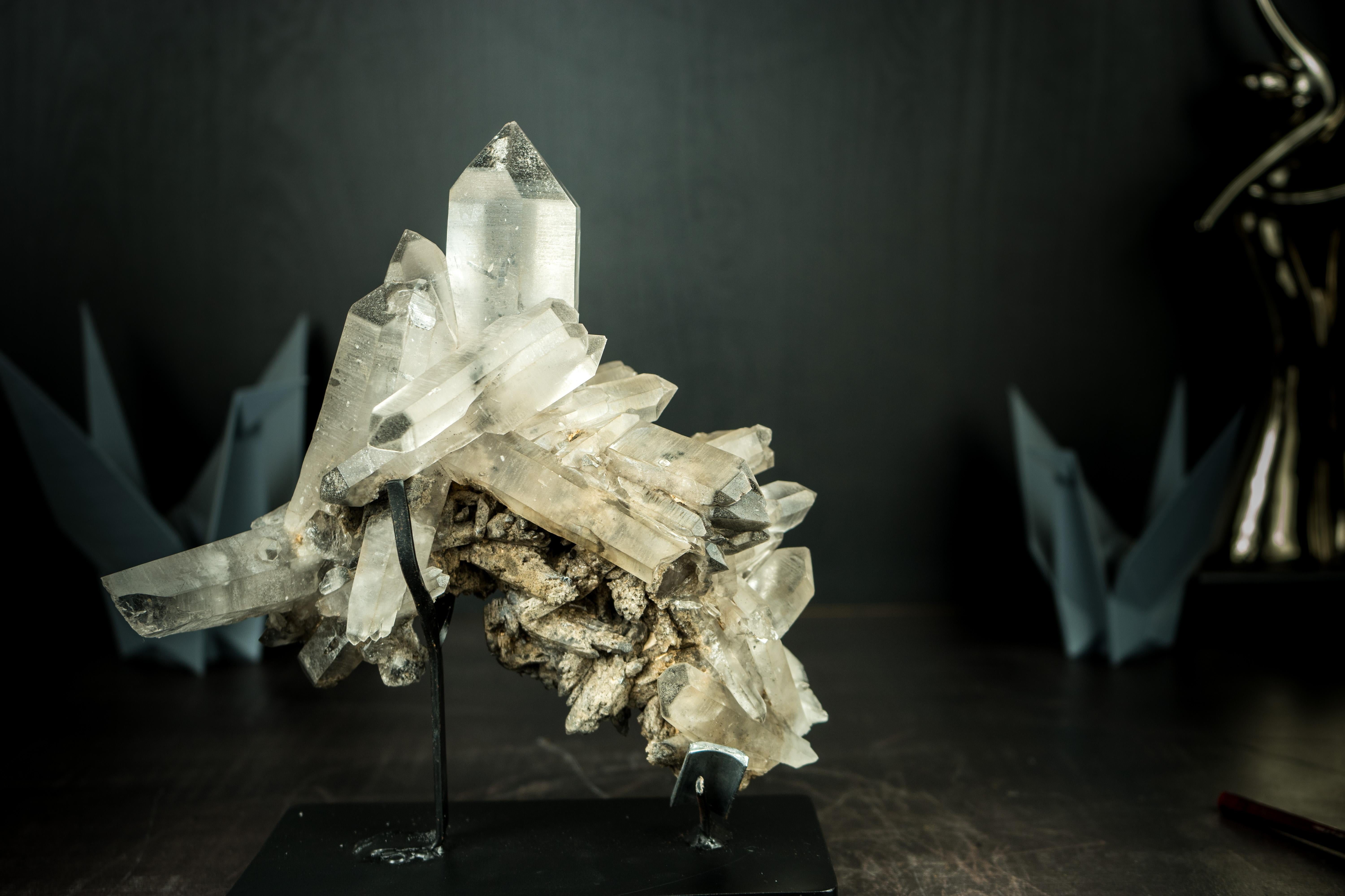 Straight from the famous Araçuaí-Itinga mines, this rare specimen is an all-natural Lemurian with a Lithium Crystal Cluster, bringing beautiful aesthetics as well as the energy of two exceptional crystal varieties in one remarkable piece. It is