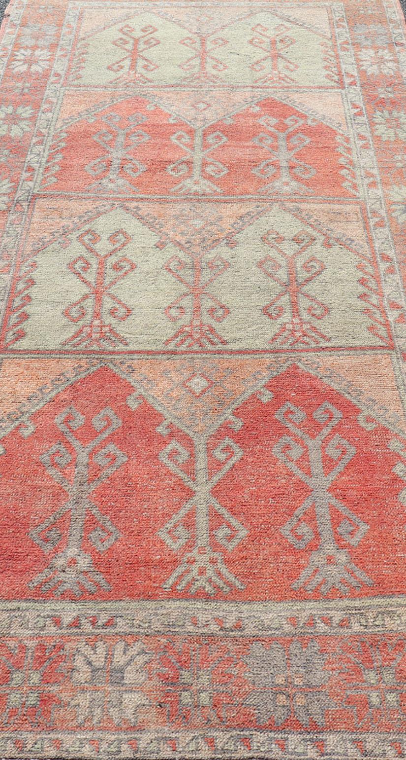 Gallery Rug, Vintage Turkish in Faded Red, Coral, Orange, Soft Pink and Green For Sale 3