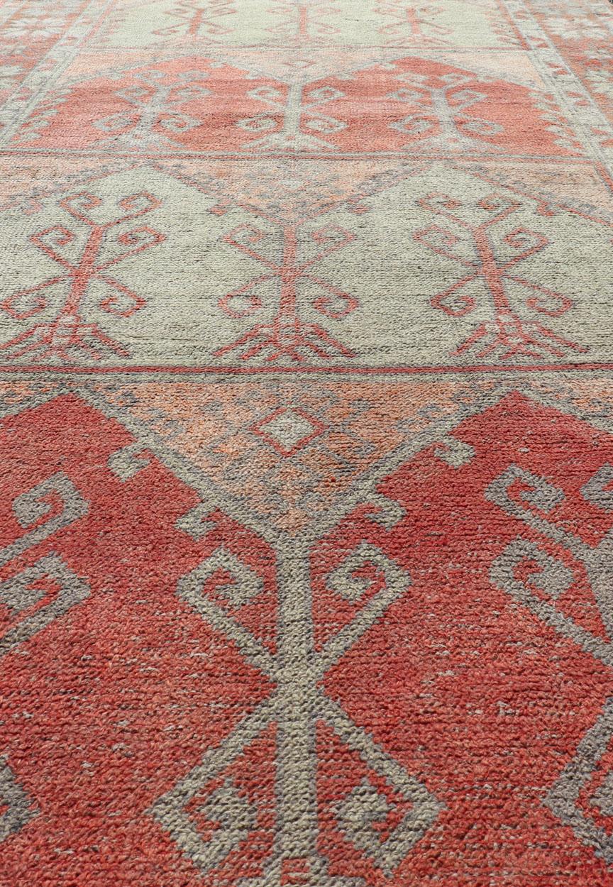 Gallery Rug, Vintage Turkish in Faded Red, Coral, Orange, Soft Pink and Green For Sale 4