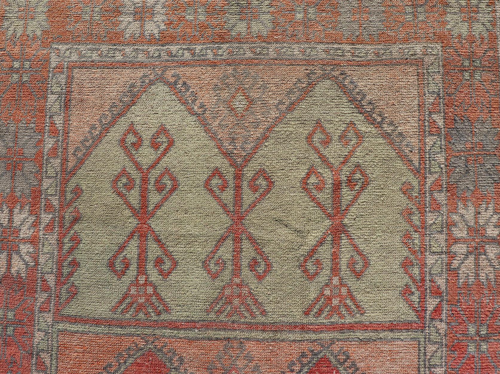 Gallery Rug, Vintage Turkish in Faded Red, Coral, Orange, Soft Pink and Green For Sale 7