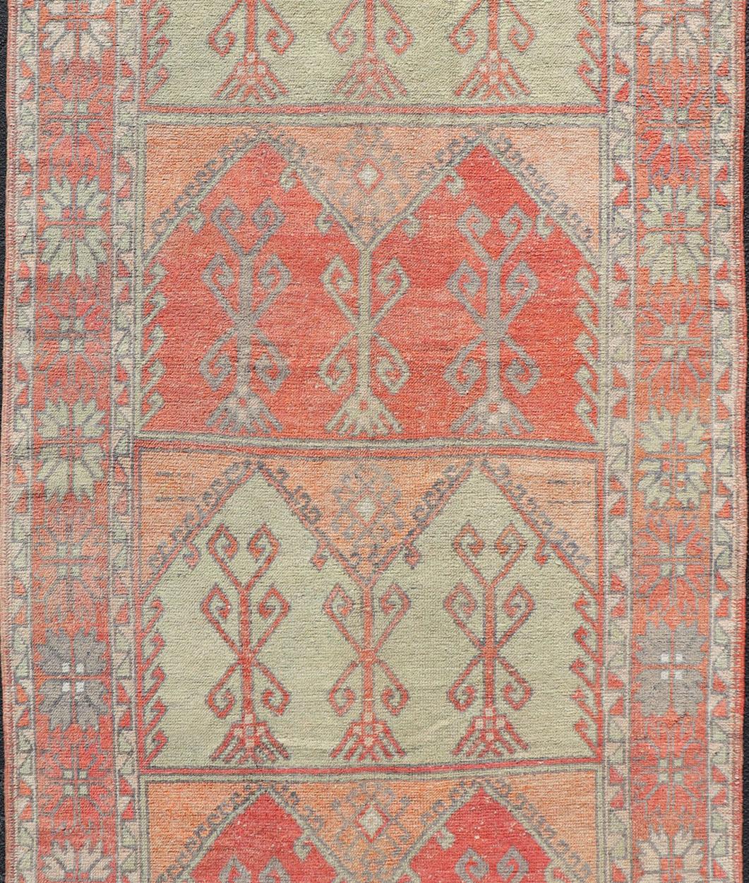 Oushak Gallery Rug, Vintage Turkish in Faded Red, Coral, Orange, Soft Pink and Green For Sale