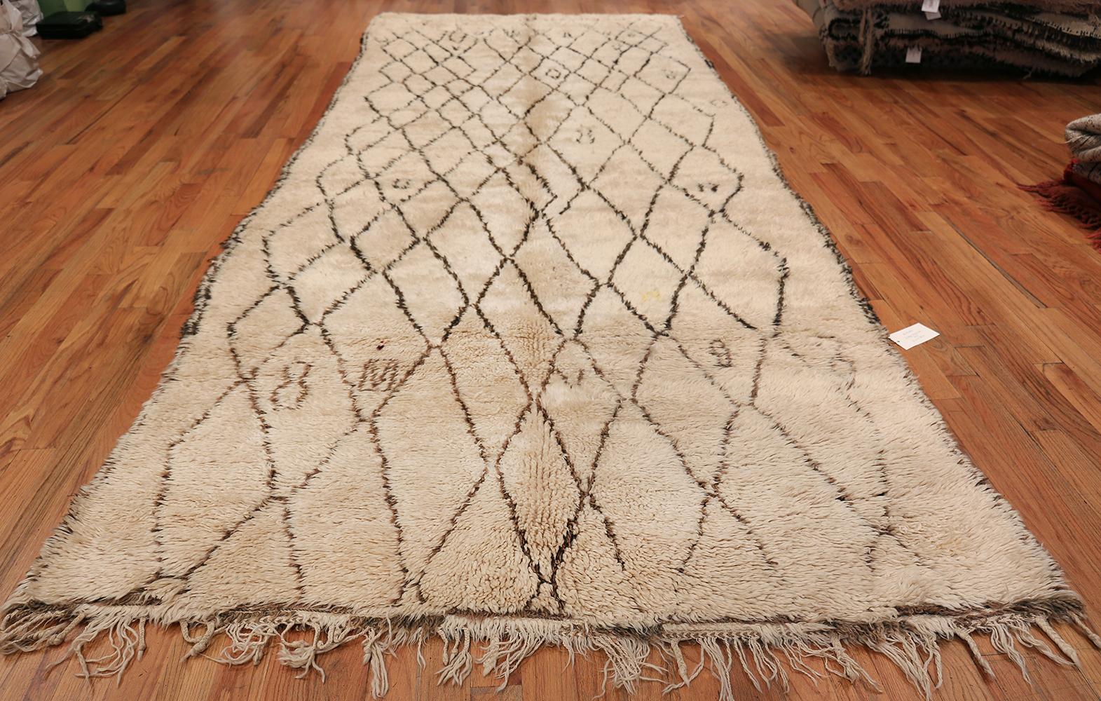 Magnificent Ivory Background Color Gallery Size Vintage Moroccan Beni Ourain Rug , Country of Origin / Rug Type: Morocco, Circa Date: Mid – 20th Century. Size: 6 ft 2 in x 15 ft (1.88 m x 4.57 m)

Vintage mid-century Moroccan rugs are an excellent