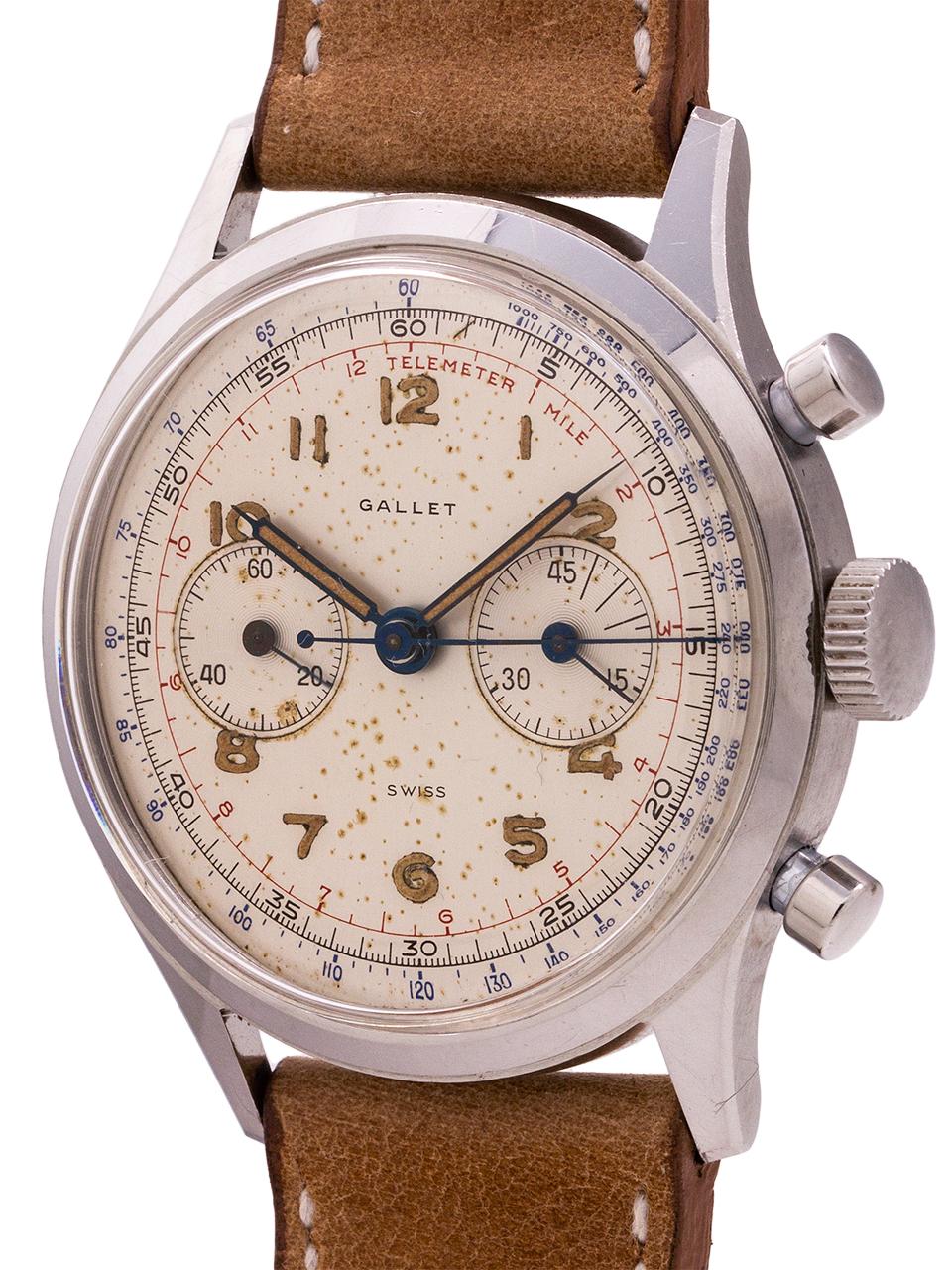 
Oversize vintage Gallet 2 registers manual wind chronograph circa 1950. Featuring a 37 x 44 stainless steel case with heavy compressor case back, round chronograph pushers, and with very pleasing original matte silvered dial with luminous arabic