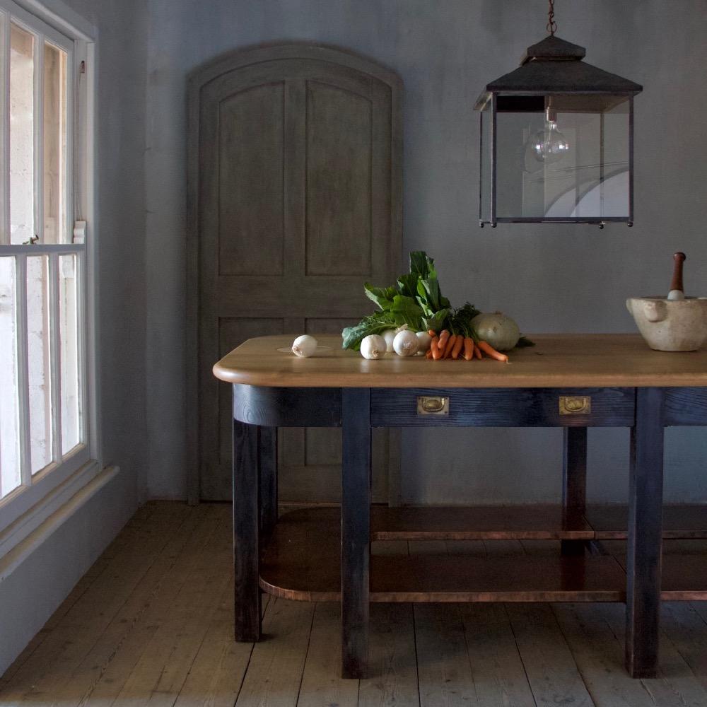 A spare and elegant brass lantern inspired by the English country house kitchen. 

Made to measure – the galley lantern can be scaled as required and any number of light bulbs fitted. Ceiling roses, hooks and chain cut to length may be ordered