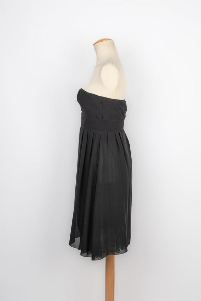 John Galliano - (Made in France) Black silk bustier dress. Size 40FR.

Additional information: 
Condition: Very good condition
Dimensions: Chest: 42 cm - Waist: 37 cm - Length: 75 cm

Seller Reference: VR171