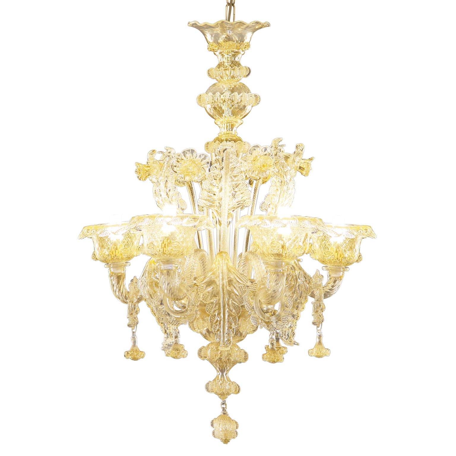 The peculiar characteristic of the Galliano lighting collection is the richness of its decorations.
This artistic luxury glass chandelier has 6-light, is handmade in gold glass.
Galliano is our tribute to the authentic Murano glass tradition. It