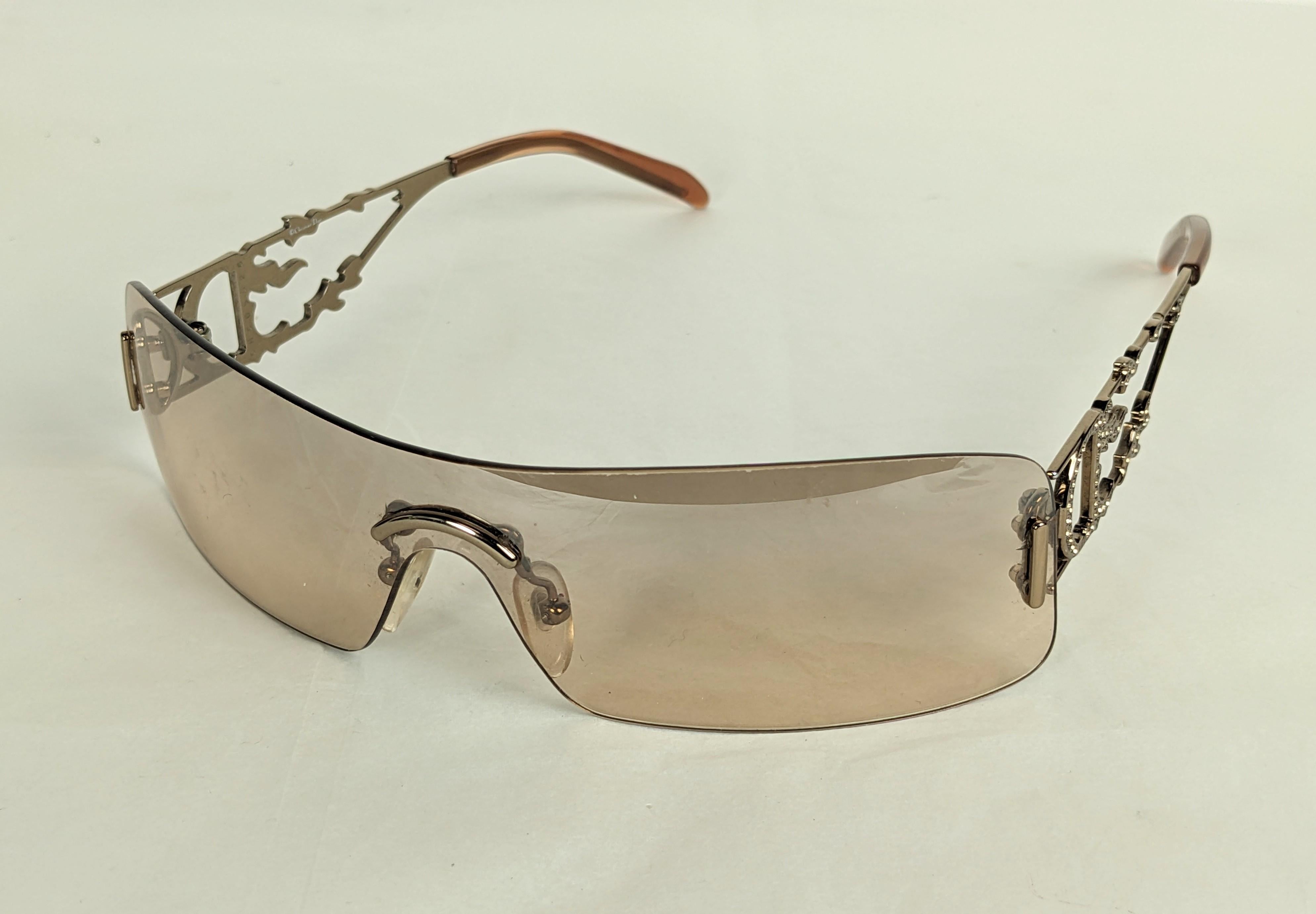 Christian Dior Logo Sunglasses, Pave Flame/Fire Frames, Y2K by John Galliano in rare rose tint. Side arms designed with conjoined CD with pave crystals in flame motifs. 
Markings: CHCD5026, Christian Dior, Made in Austria, Dior Fire, 616 125. 6