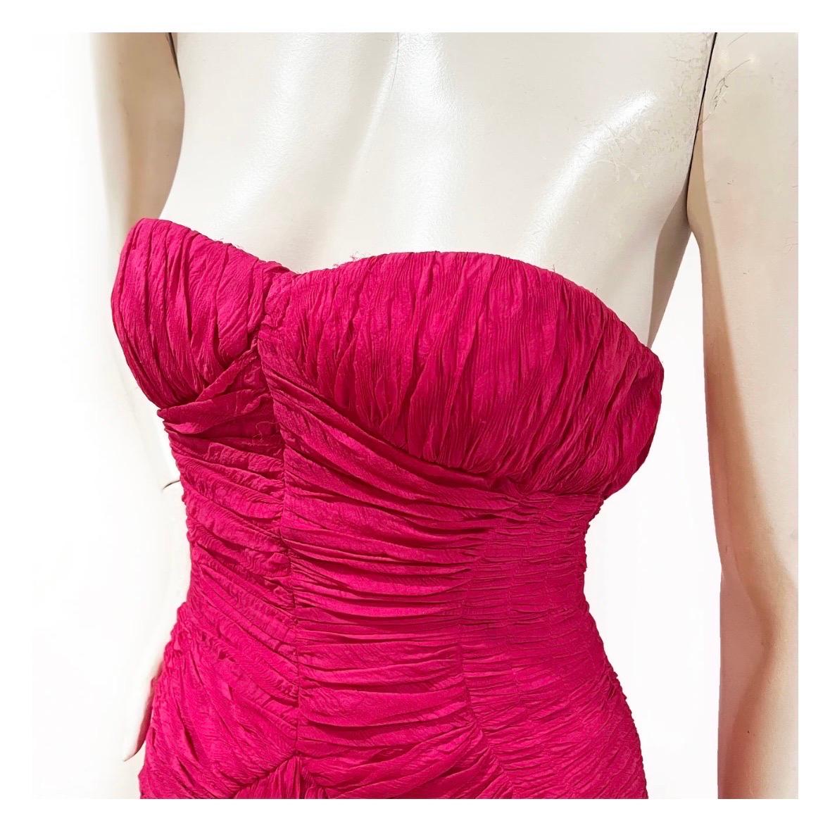 Magenta designer mini dress by John Galliano for Christian Dior
Spring 2009 Ready-To-Wear
Made in France
Strapless
Sweetheart neckline
Interior corset 
Ruched throughout bodice
Ruffled skirt  
Back zipper closure 
100% silk, 100% silk
