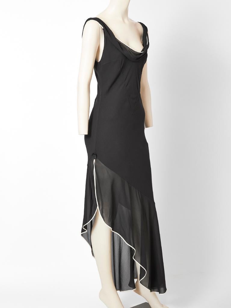 John Galliano for Dior, black, silk georgette, bias cut cocktail dress with a deep front and back neckline. Dress is lined in a nude tone georgette having an attached sheer bias cut, asymmetric flounce that starts at the thigh. Flounce has a white