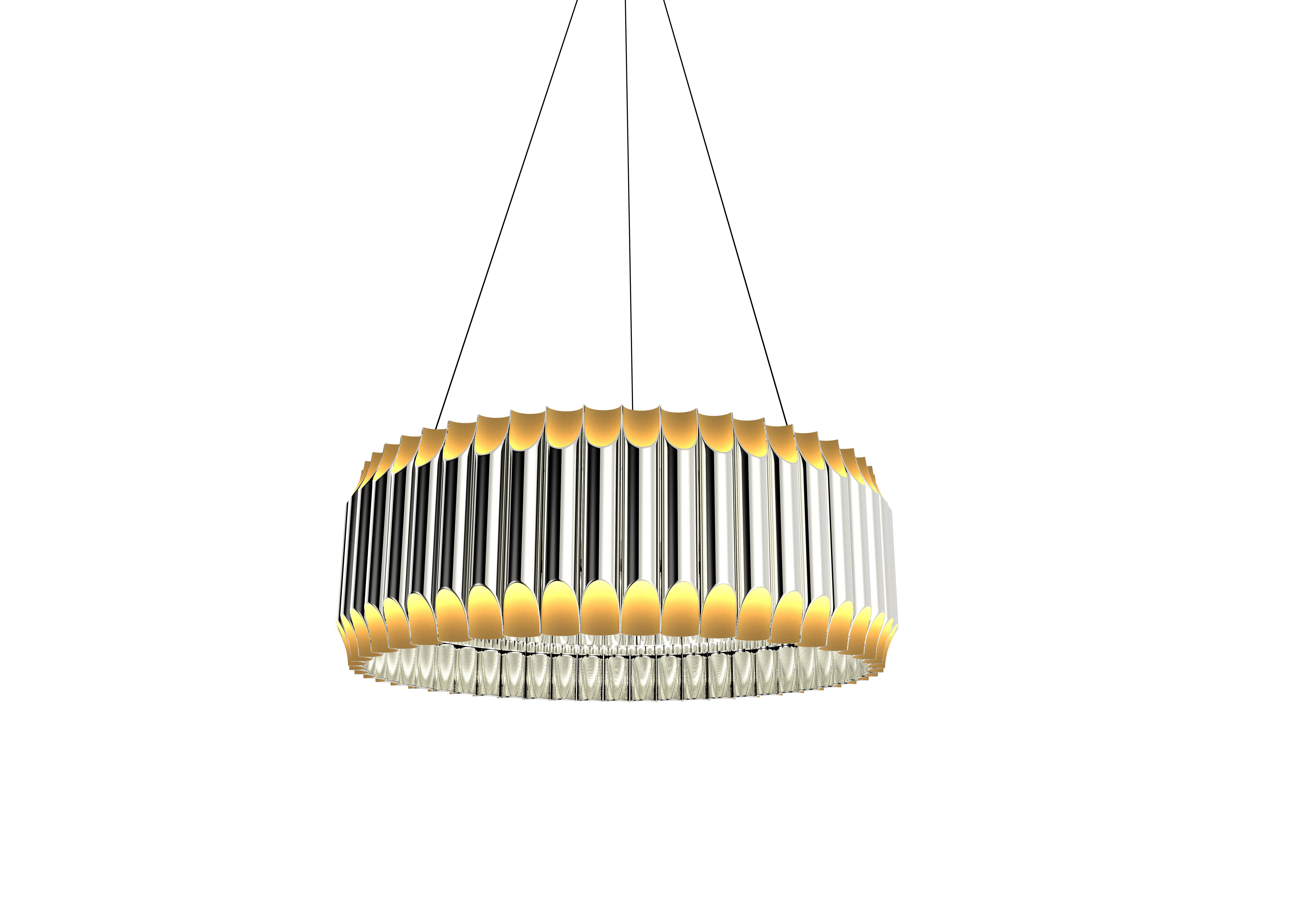 Galliano round chandelier is a Mid-Century Modern light with a shape that was inspired by a pipe organ. With sculptural shapes and an extremely balanced design, this modern lighting design gets even more beautiful when you see the light being casted