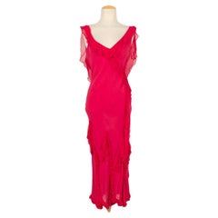 Robe longue Galliano en mousseline de soie et soie dans les tons roses