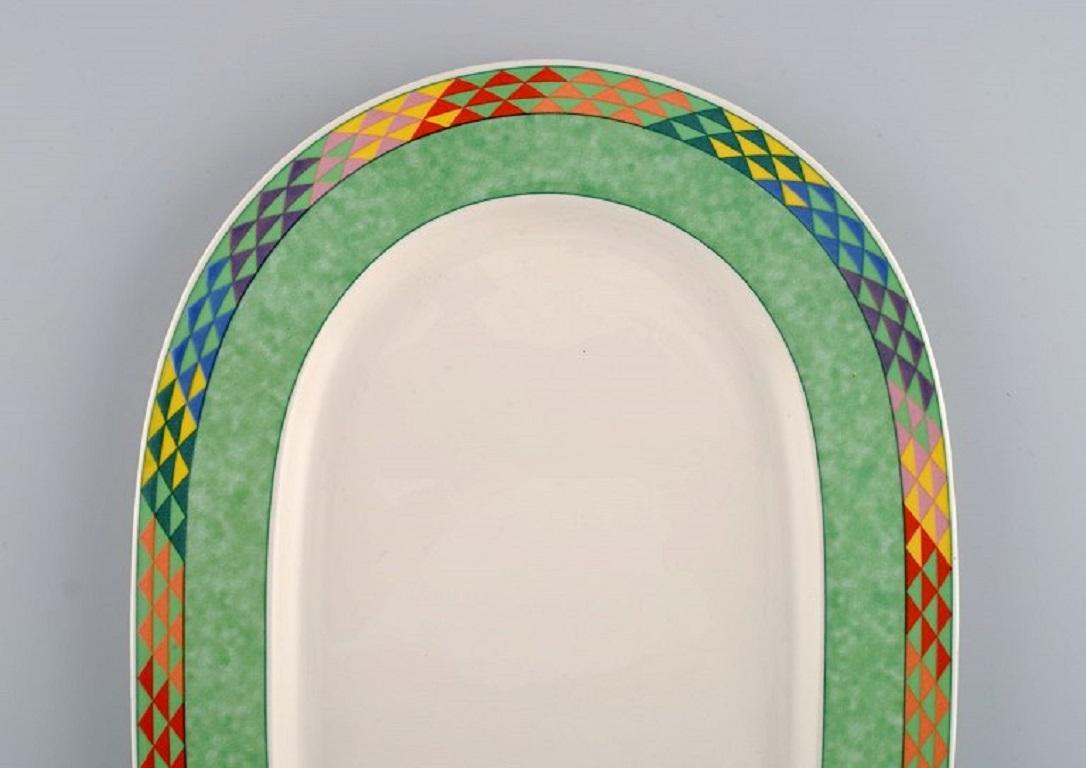 Gallo Design, Germany. 
Oval Pamplona porcelain dish. Colorful decoration. Late 20th century.
Measures: 34.5 x 23.5 cm.
In excellent condition.
Stamped.