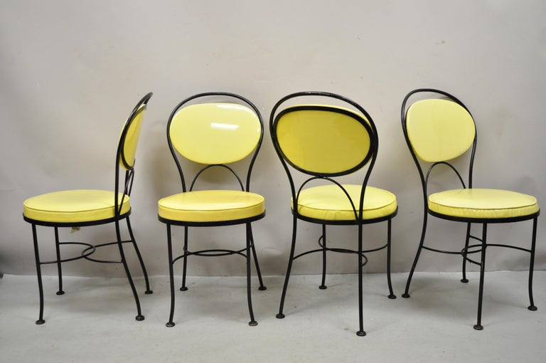 Gallo Original Iron Works wrought iron yellow Vinyl Modern Bistro dining chair - set of 4. Item features yellow vinyl upholstered oval/round backs and seats, wrought iron construction, original labels, very nice vintage set, quality American