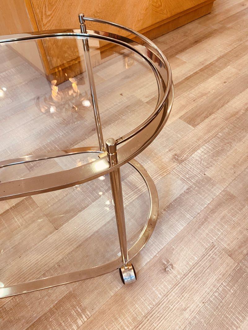 Pieza histórica de la colección Gallotti & Radice. Fue diseñada por Pierangelo Gallotti, propietario histórico de la empresa. Las formas, los materiales y los colores encarnan a la perfección el estilo de la época: la fría estructura de latón
