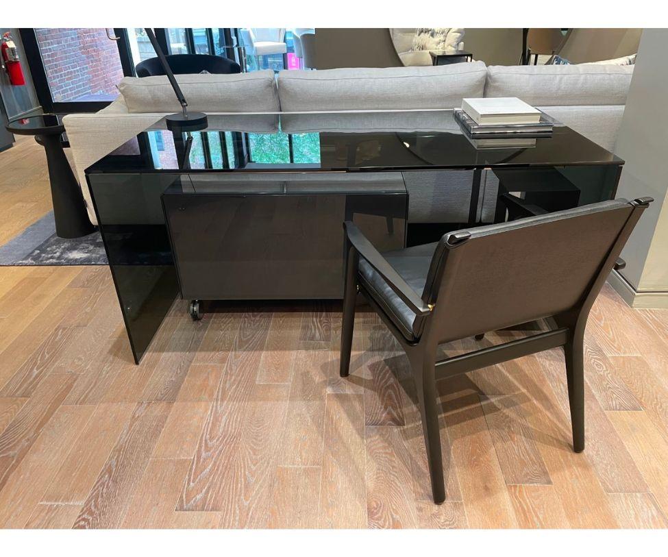 Designed By Pinuccio Borgonova

Quantity Available: 1

Clear office desk in smoked glass. 

Finish: Desk in 12 mm smoked 