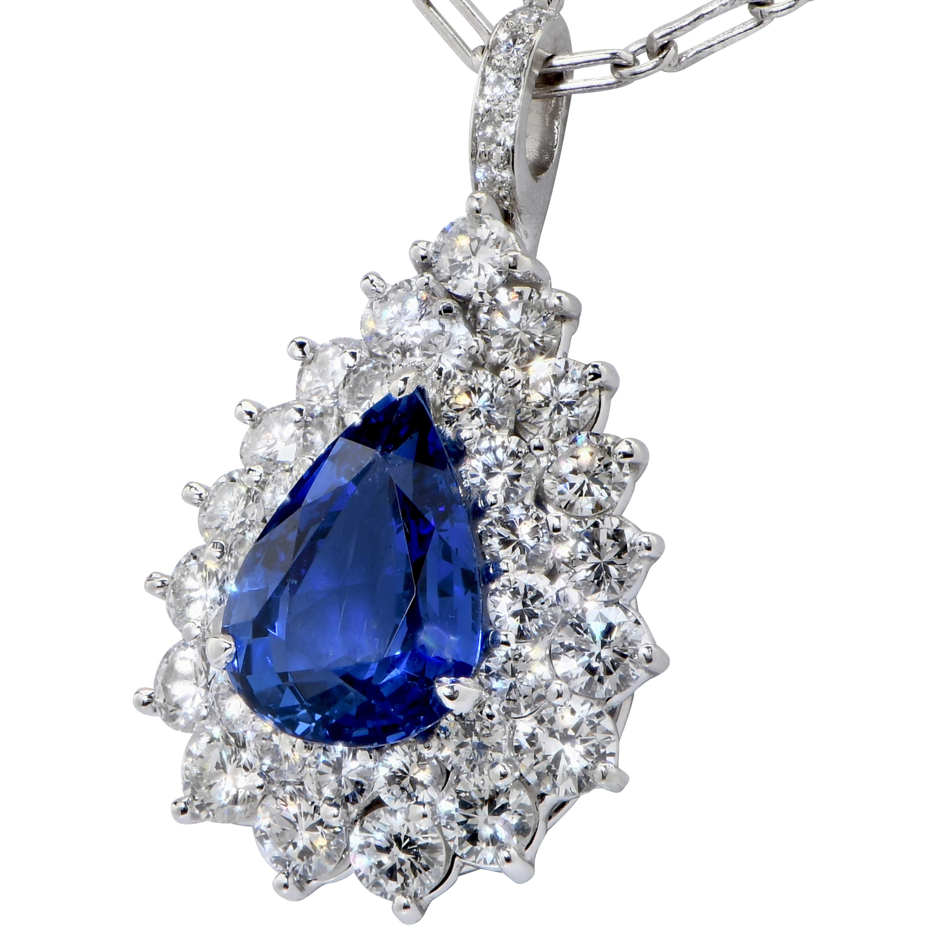 Galt Approximately 4 Carat AGL Graded Ceylon No Heat Pear Shape Sapphire and Diamond Pendant featuring a 4.27 carat pear shaped sapphire with an American Gemological Laboratories (AGL) grading report denoting it as Ceylon NO HEAT surrounded by 38