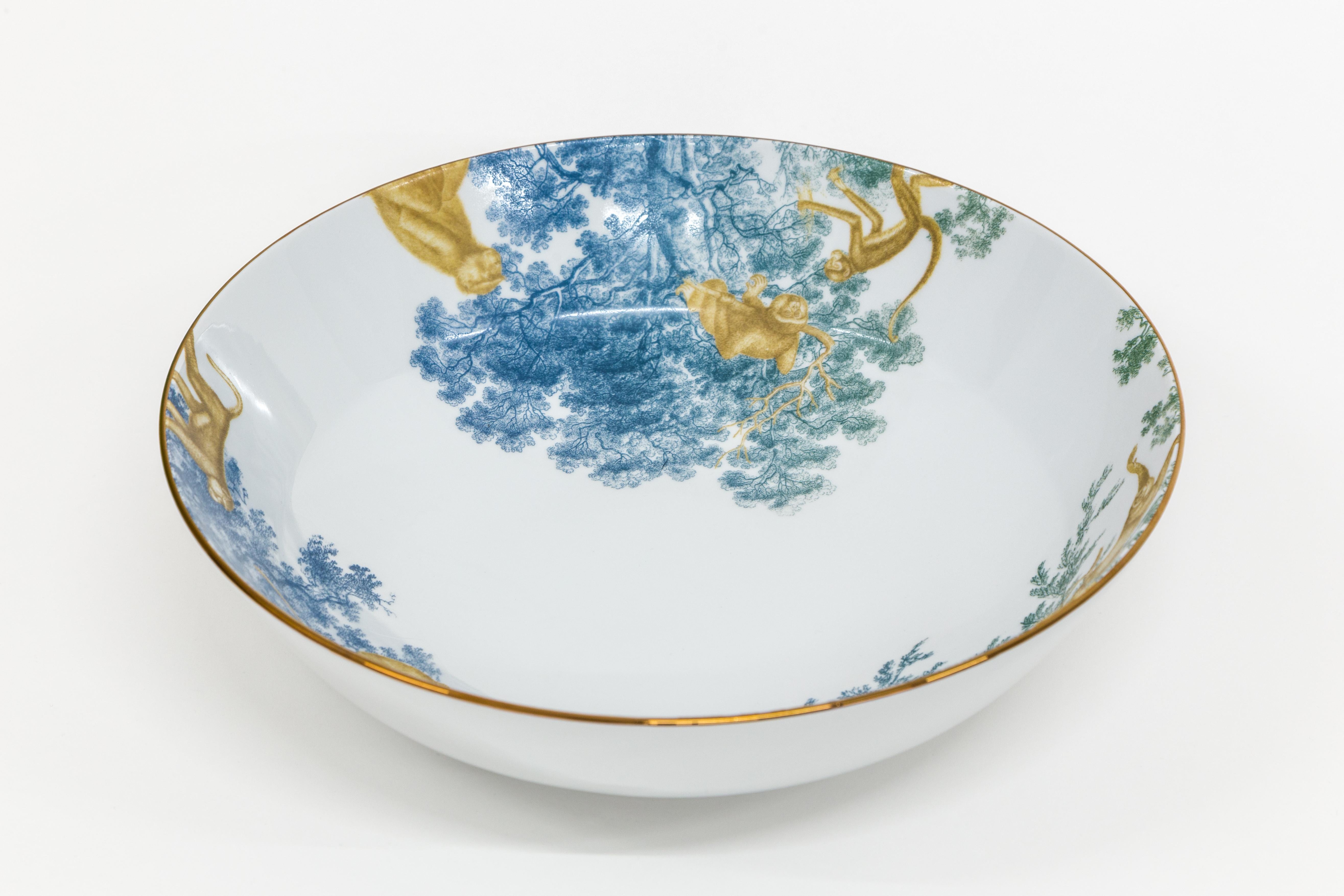 This 34cm diameter bowl is part of the Galtaji Monkey Temple collection by Grand Tour By Vito Nesta. The very versatile shape is suitable as a fruit stand, table centerpiece or ornamental bowl on any shelf. The bowl is surrounded by blue-green tree
