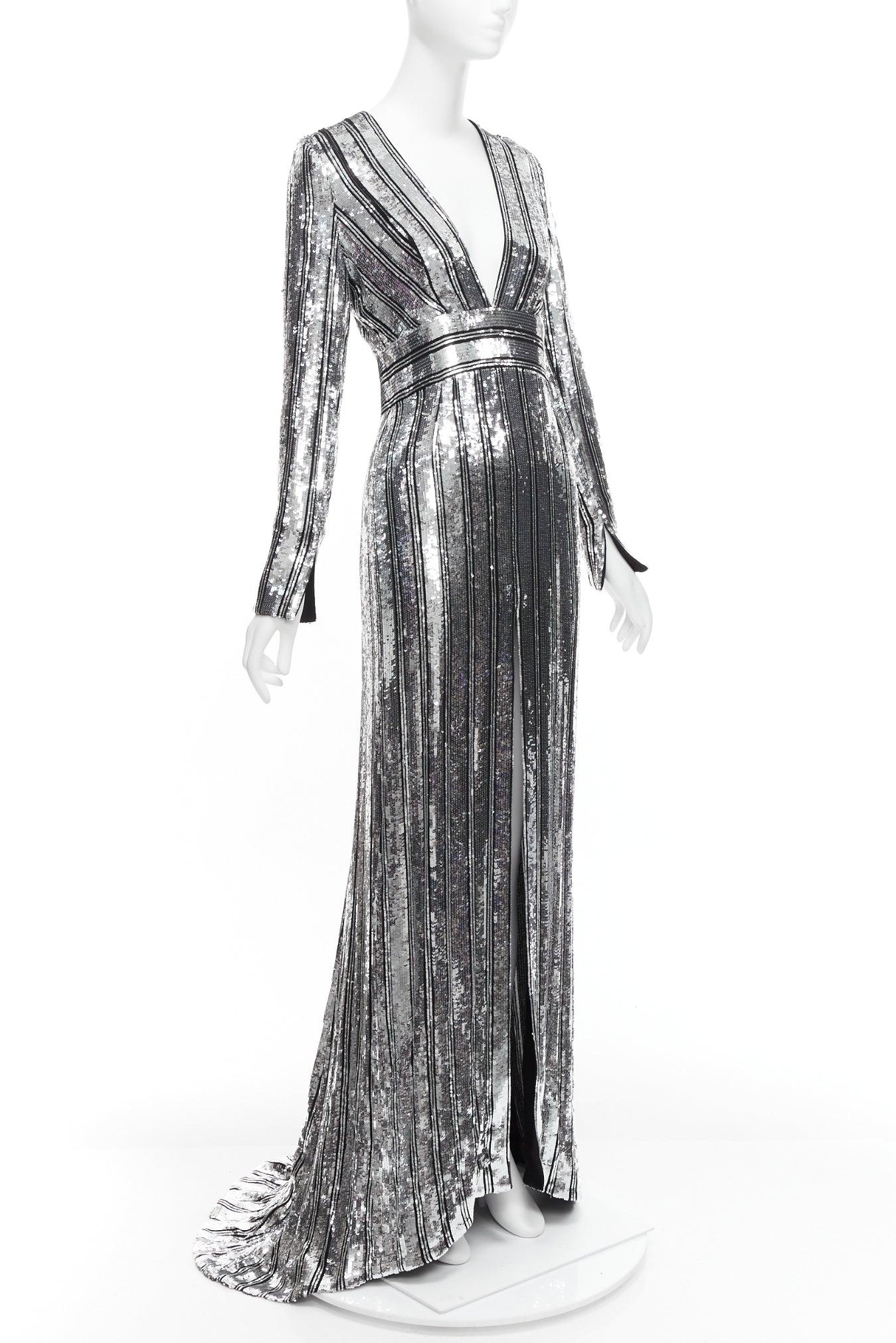 GALVAN LONDON 1616 Stardust silver black sequin deep V slit sleeve gown IT36 XXS
Reference: JACG/A00142
Brand: Galvan
Model: 1616 Stardust
Material: Viscose
Color: Silver, Black
Pattern: Sequins
Closure: Zip
Lining: Black Polyester
Extra Details: