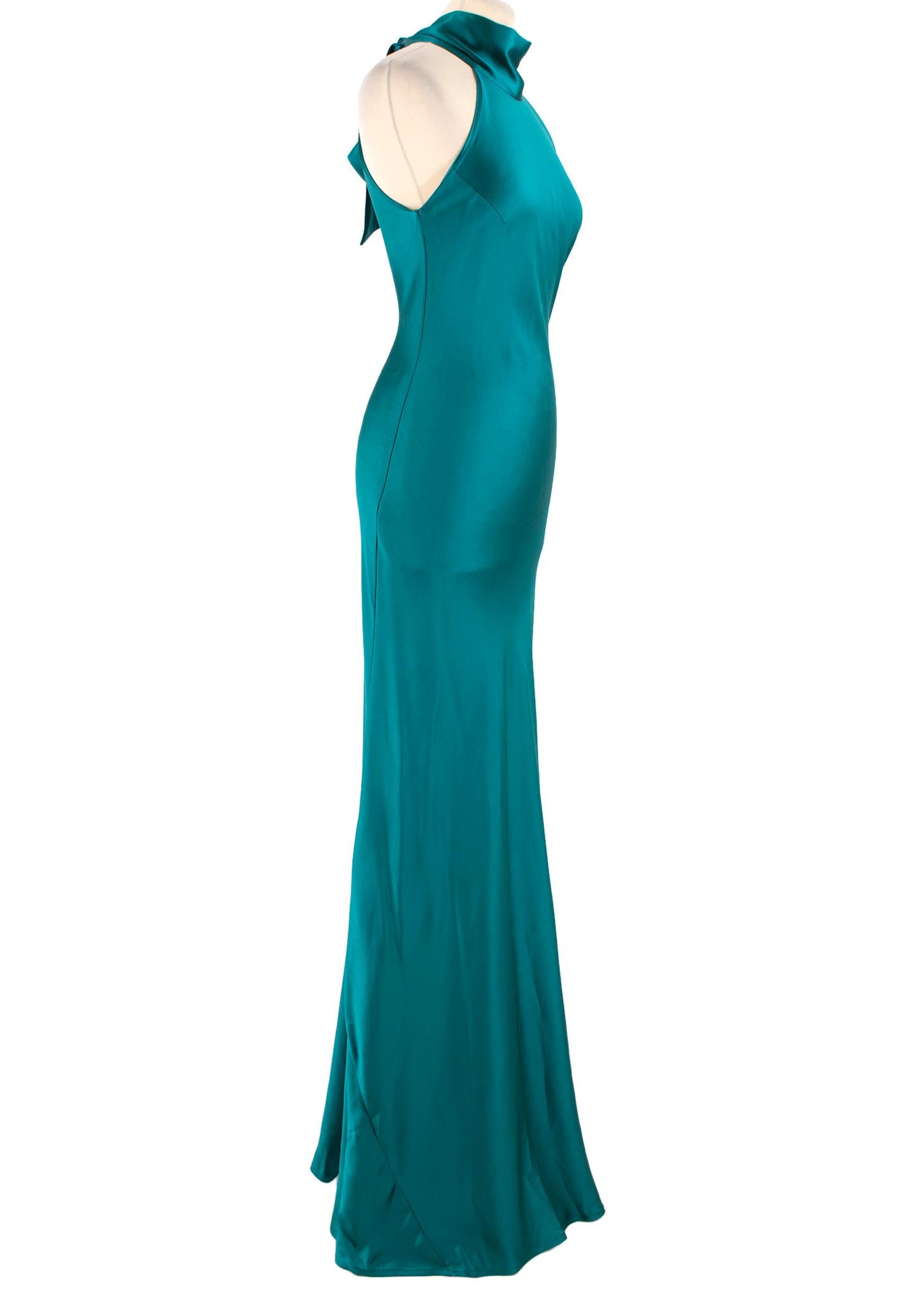 Galvan London Emerald Silk Sienna Dress

-Emerald colour, 100% silk
-Sleeveless 
-Halterneck 
-Pull-over closure 
-Keyhole opening on back

Please note, these items are pre-owned and may show some signs of storage, even when unworn and unused. This