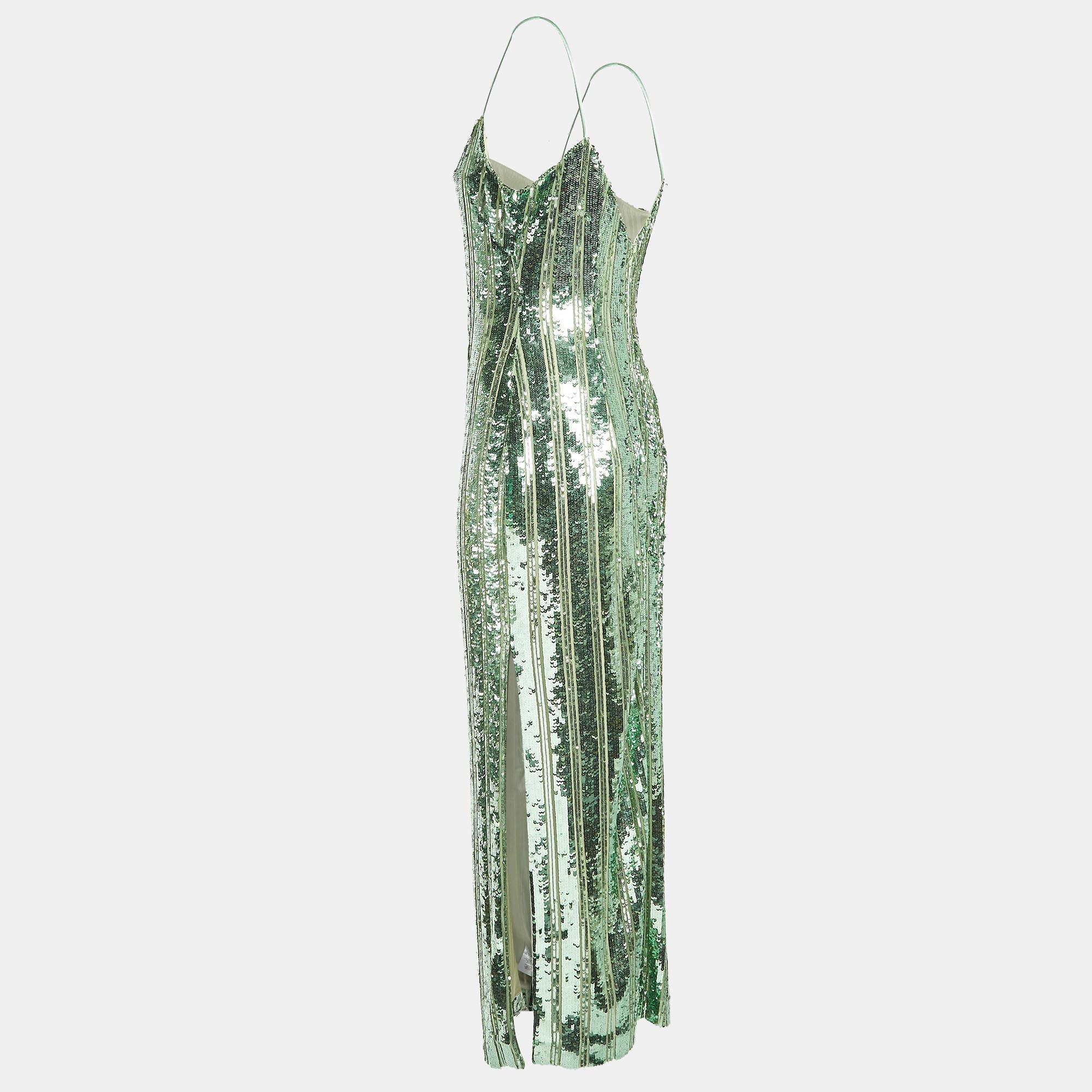 Entra nel glamour senza tempo con questo abito di Galvan London. Realizzato meticolosamente  incarna grazia e raffinatezza  è la scelta perfetta per chi è alla ricerca di un'aggiunta al proprio guardaroba.
