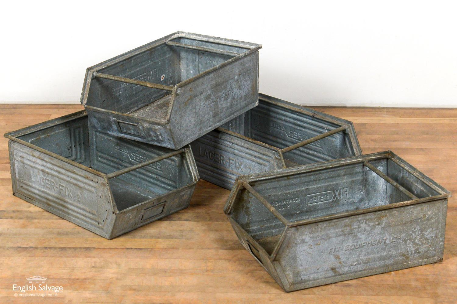 Reclaimed galvanised troughs or open fronted storage boxes / containers. Age and wear related patina and scratches and dinks throughout.