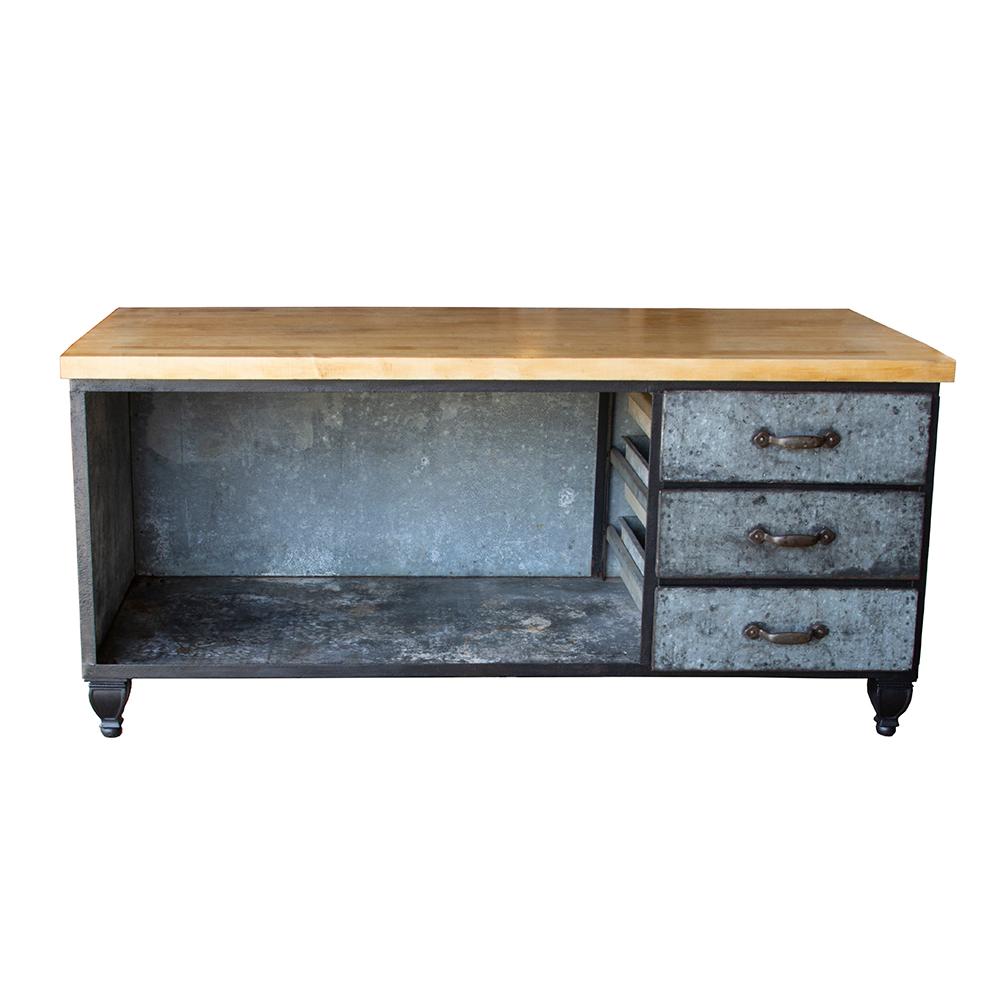 This galvanized base island has a solid maple block top. The base has a large open space for storage and three stout drawers.