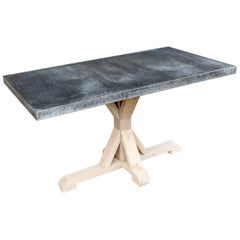 Table de salle à manger avec plateau en métal zingué et base en bois